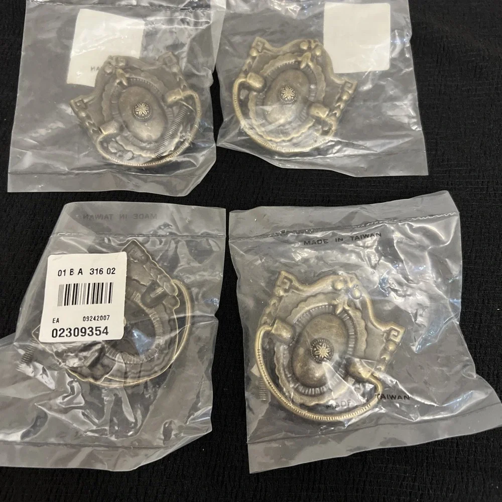 Set Of 4 Sealed Metal Reproductions Mid Century Modern Drawer Pulls